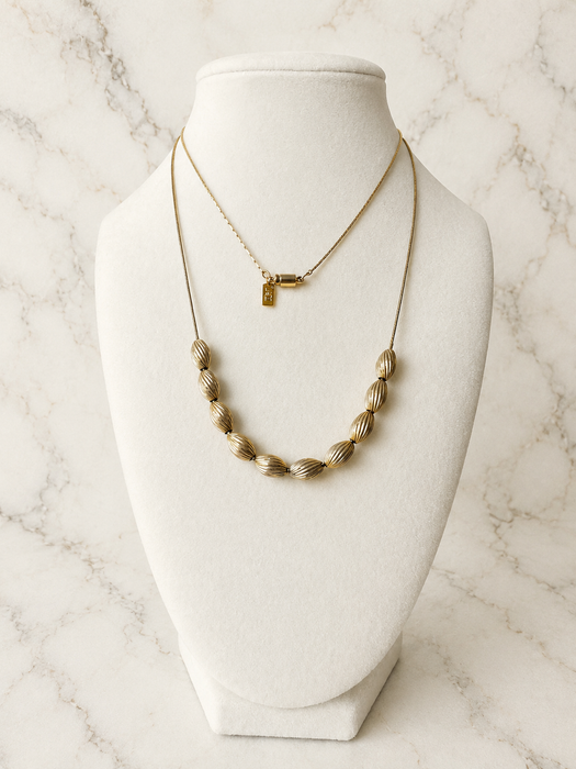 Gilded Ribbed Bead Necklace