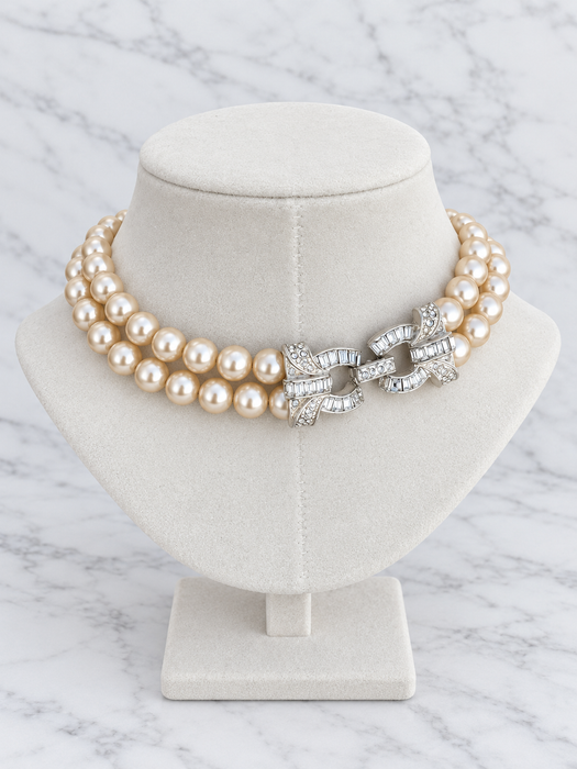 Double-Strand Pearl-Tone Necklace with Rhinestone Bow Clasp