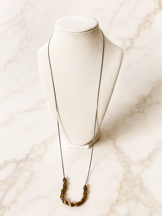 Gilded Ribbed Bead Necklace